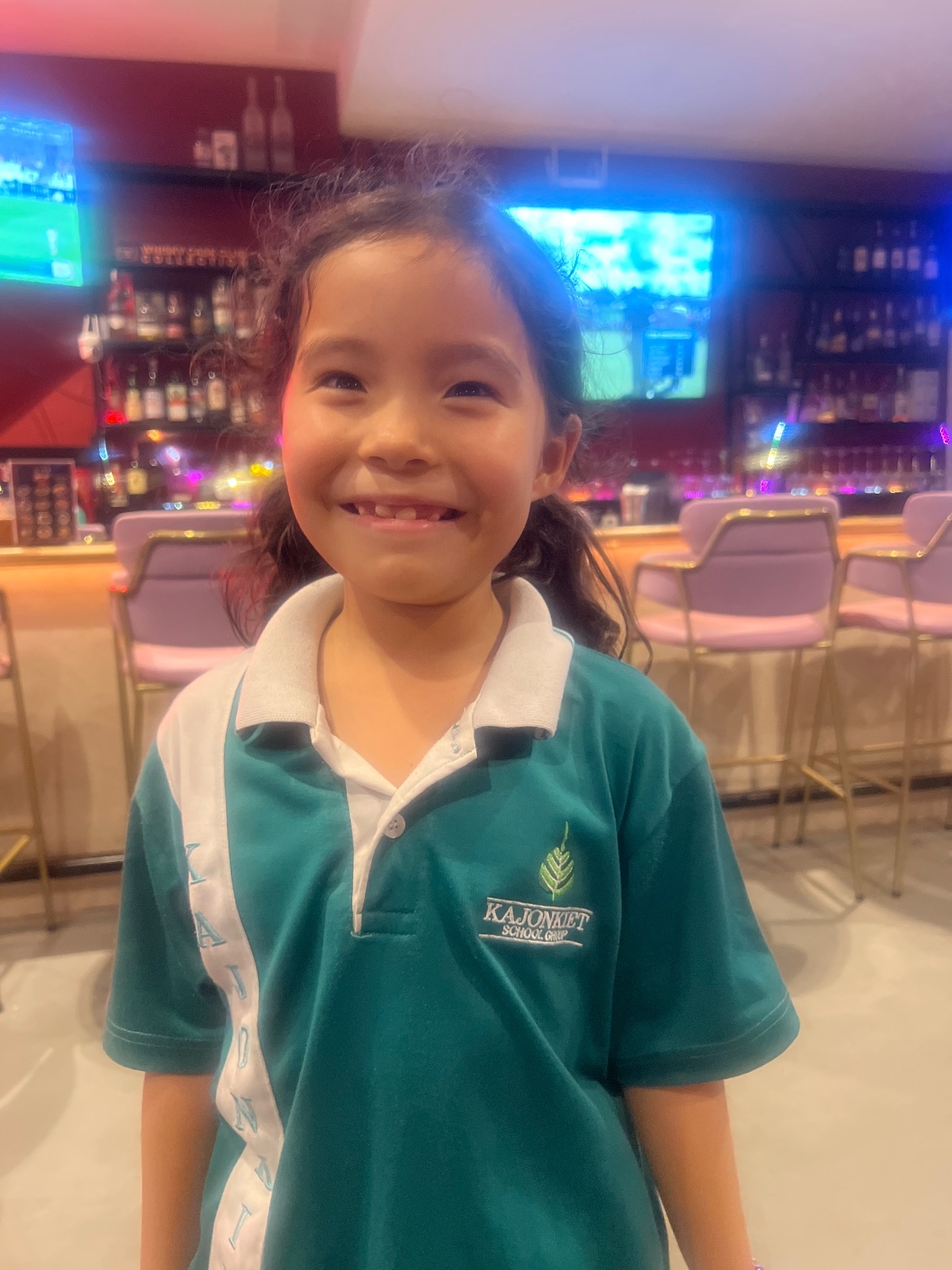 Child standing inside a venue